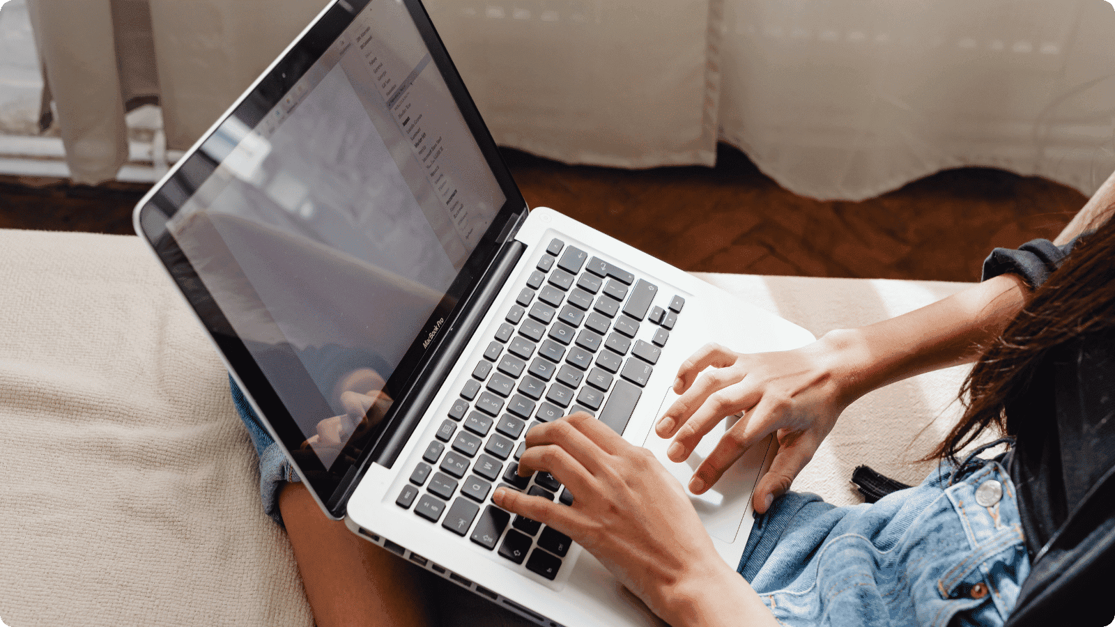 Person browsing gift catalog on laptop